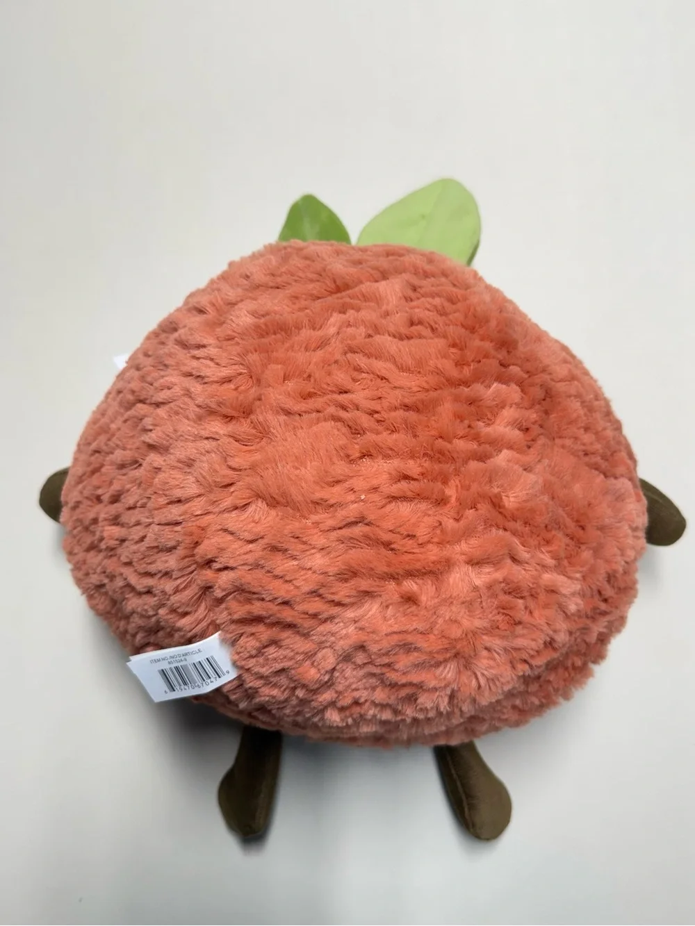 Plush Orange Fruit Character with Green Leaves
